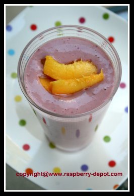 A Homemade Smoothie made with Raspberries, Blackberries, Peaches -- use fresh OR frozen fruit and optional whey!