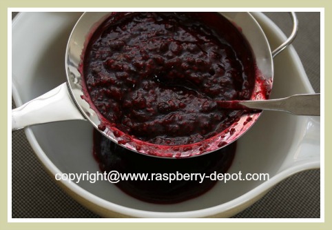 Removing the Raspberry Seeds to Make Seedless Raspberry Syrup