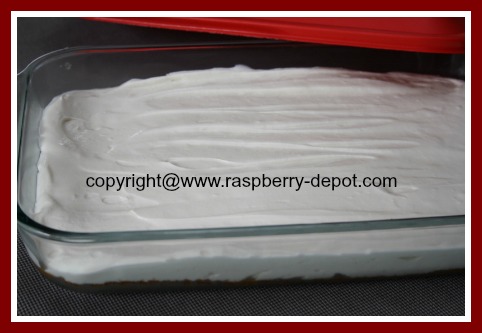 No Bake LIGHT Cheesecake Recipe with a Graham Cracker crumb crust in a 9 x 13 dish